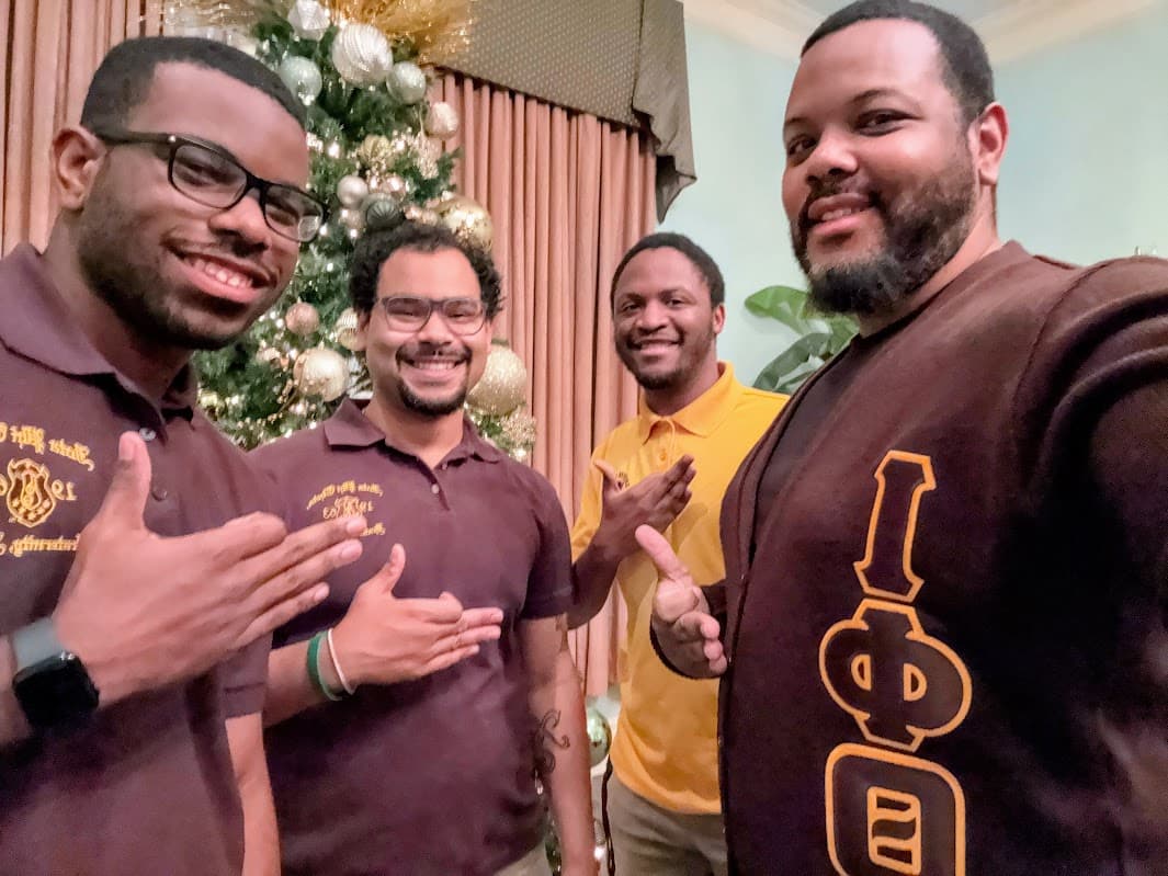 Joel Lomnick with Iota Phi Theta fraternity brothers.