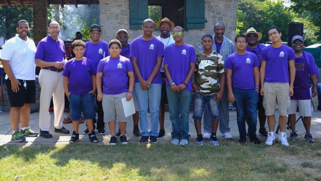 Young men's mentoring program group photo.